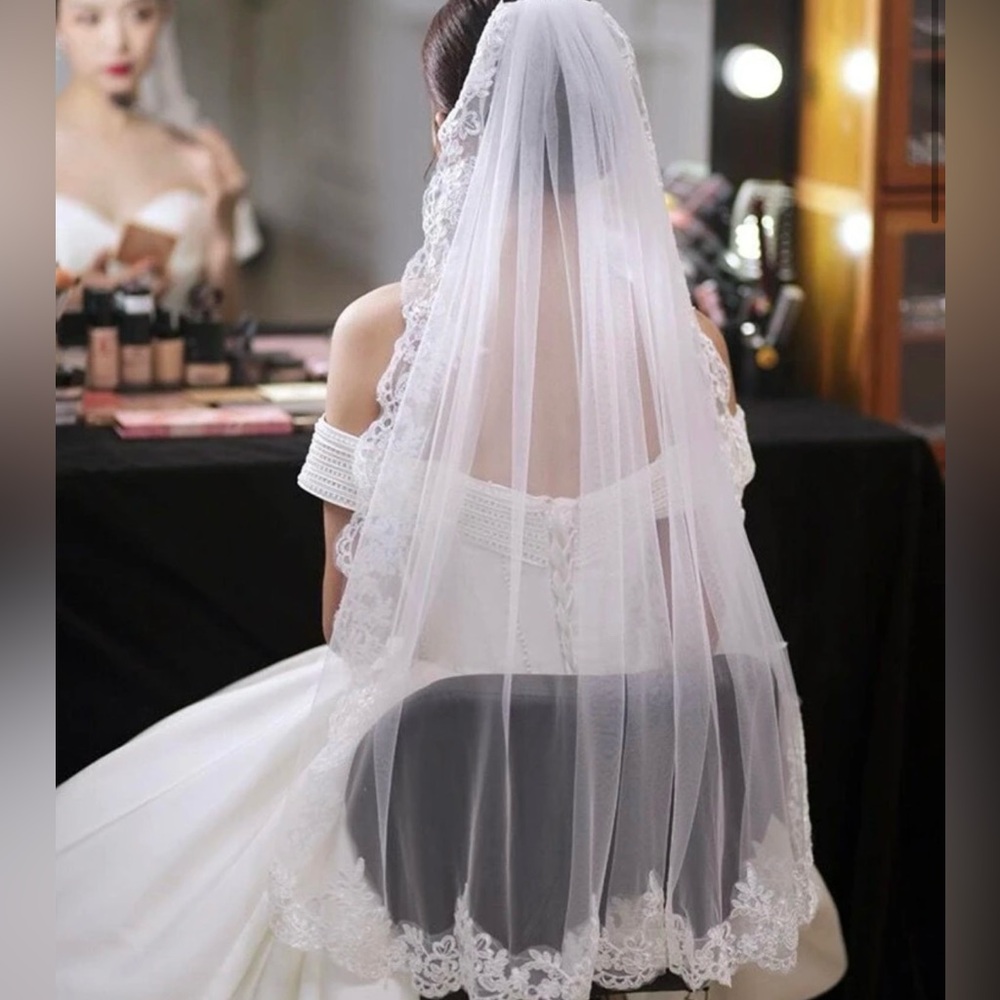 New white veil with lace